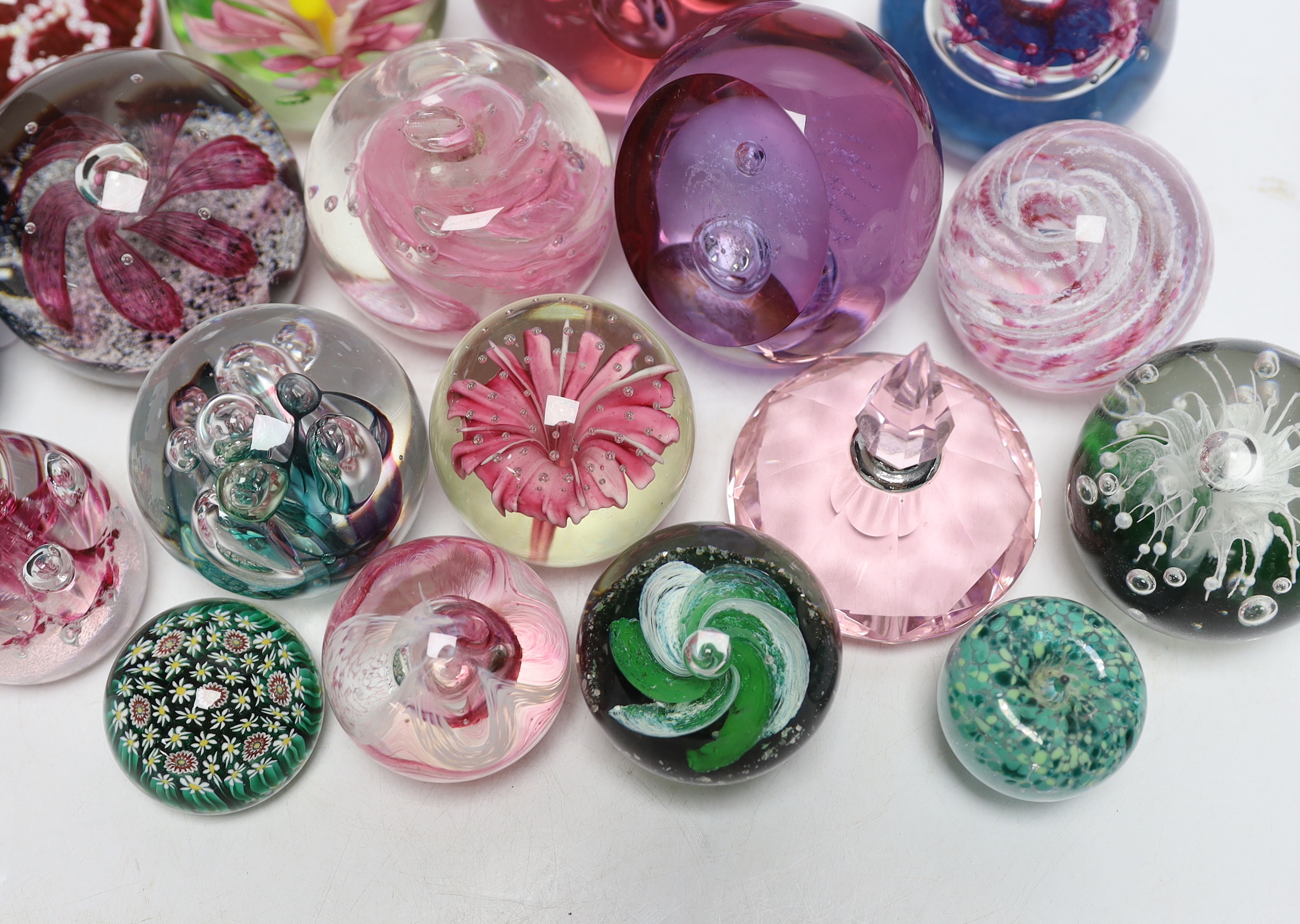 A group of glass paperweights including Caithness